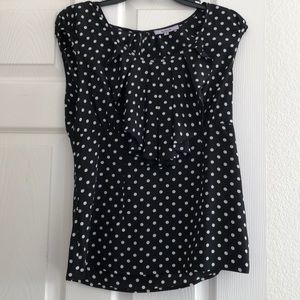 Ruffled neck polka dot black top